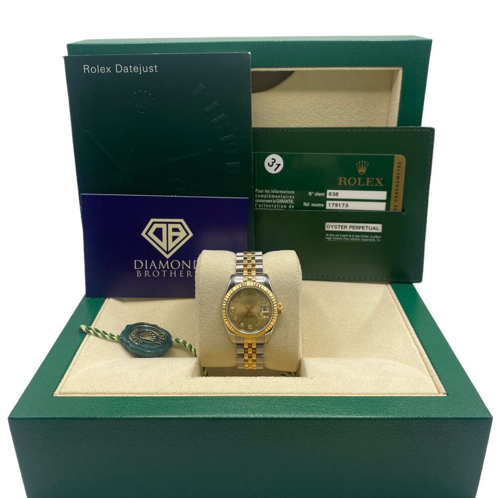 Rolex 179173 Datejust 2012 with factory diamond dot champagne dial. With box & and papers.