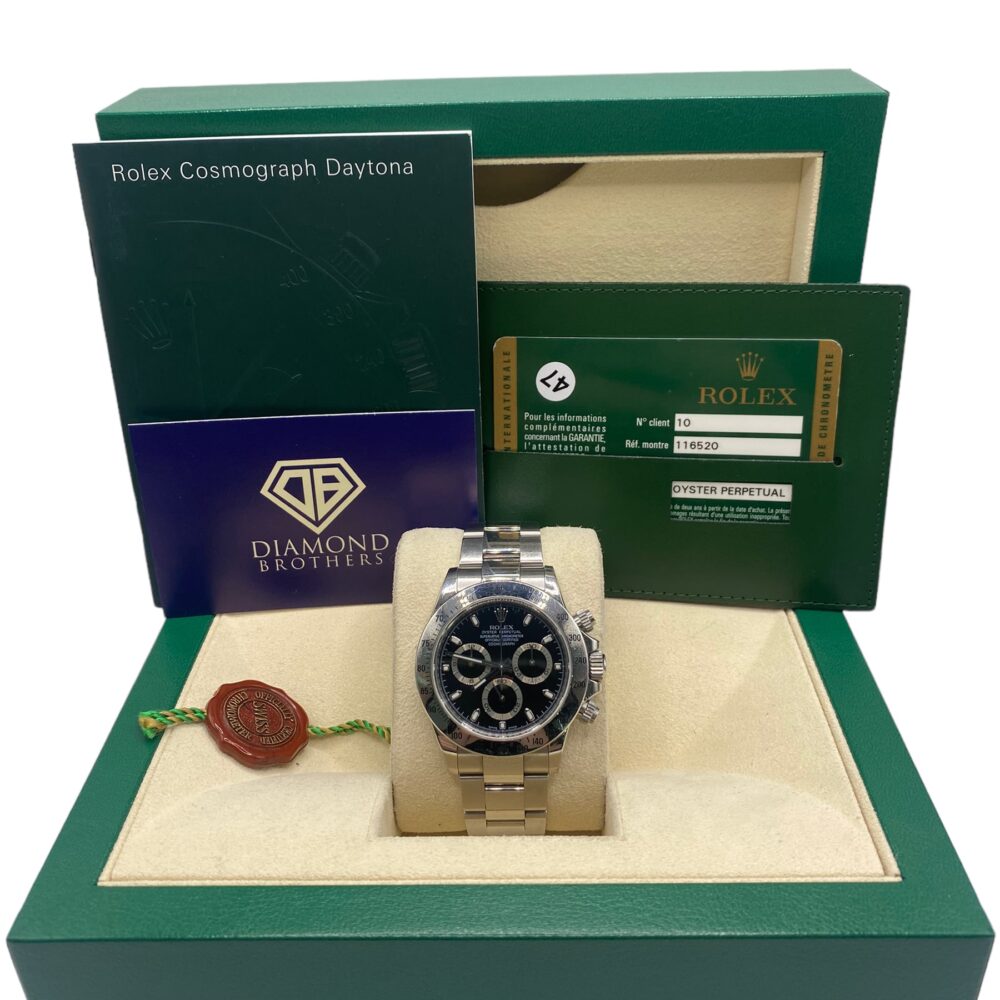 Rolex Daytona 116520 2009 with Box and Papers.